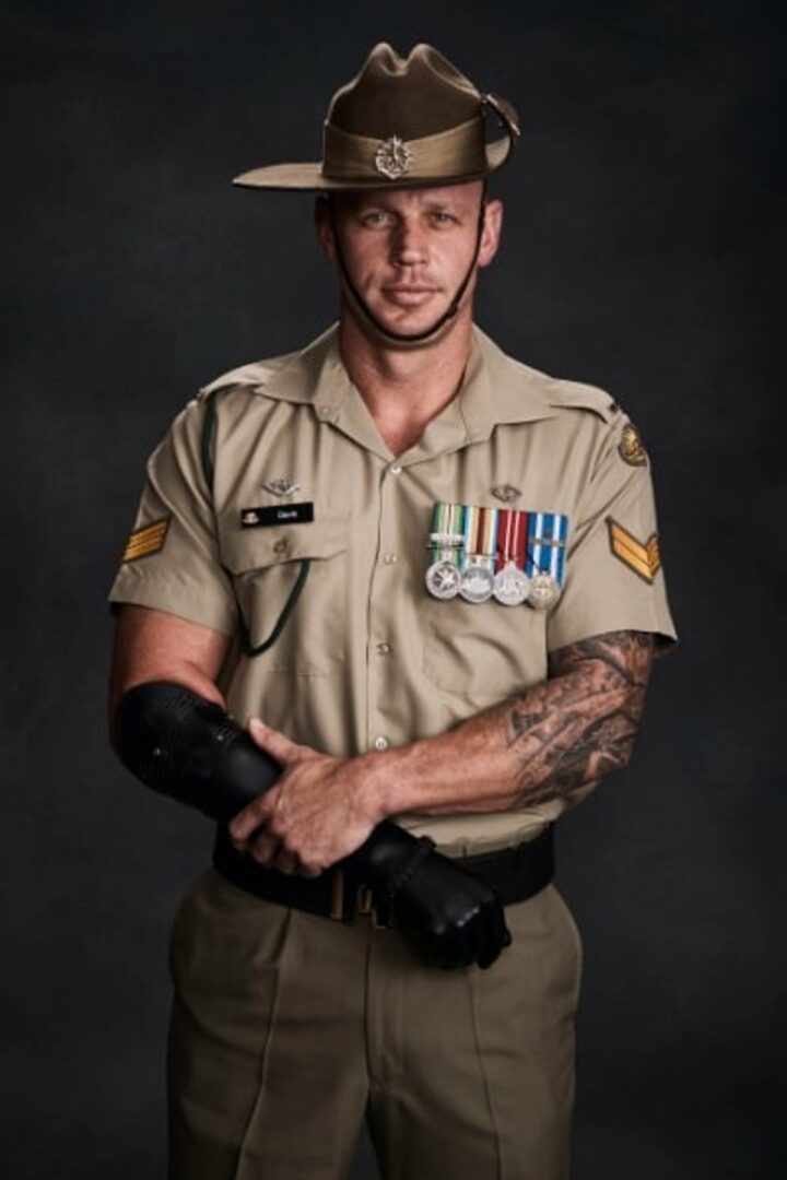 Soldier with medals and prosthetic arm